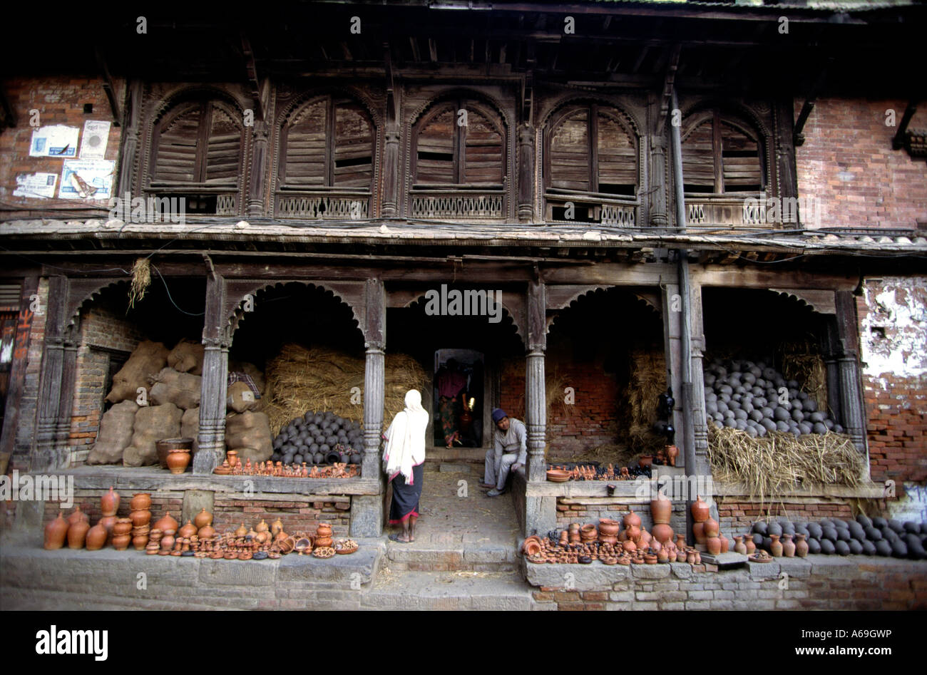 Nepal Bhaktapur ceramic shop in historic Newari wooden building Stock Photo