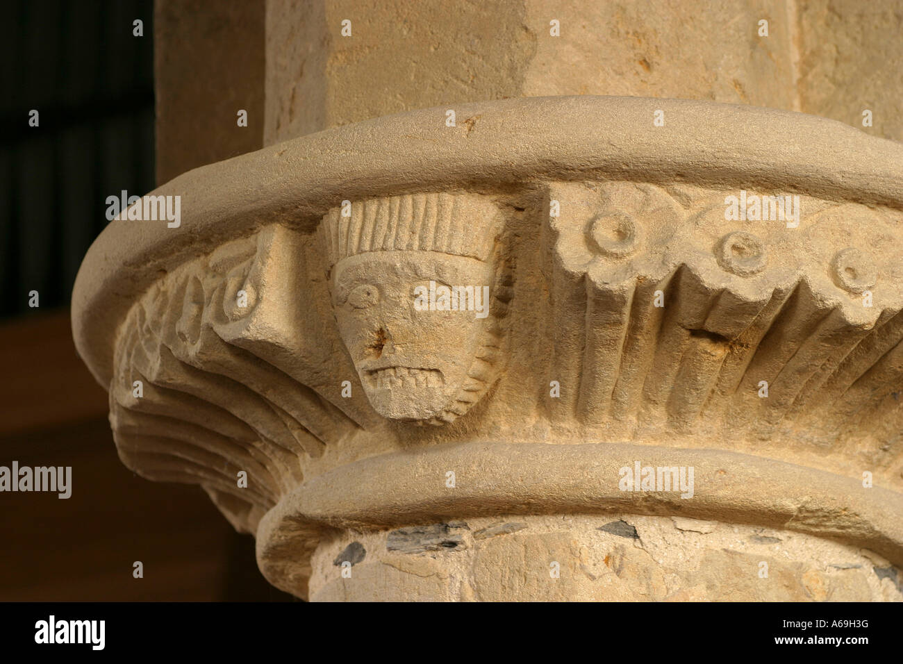 UK England Worcestershire Bretforton St Leonards Church figures carved in C12th stone pillar Stock Photo