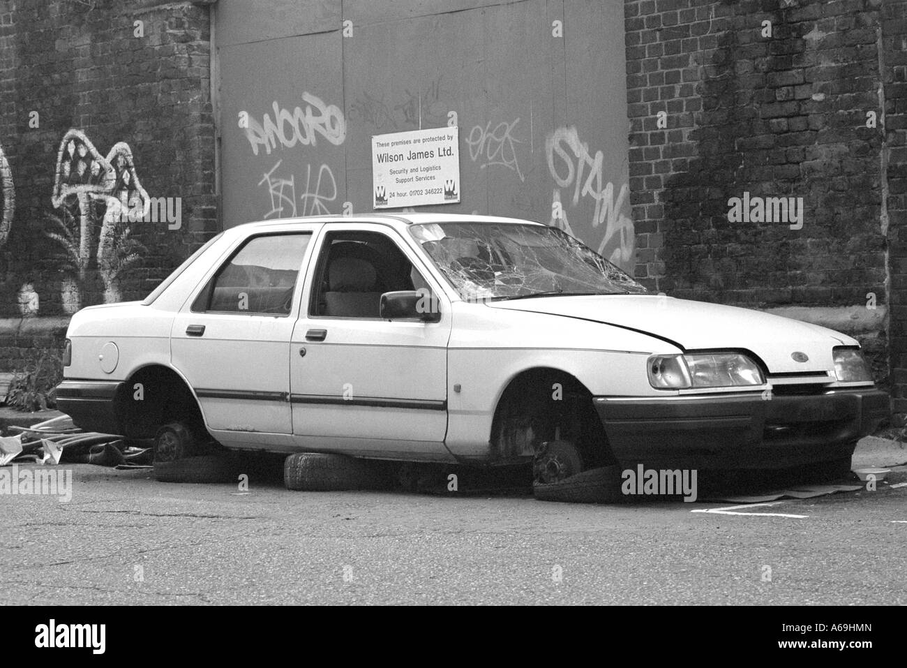 Stolen car wheels Black and White Stock Photos & Images Alamy