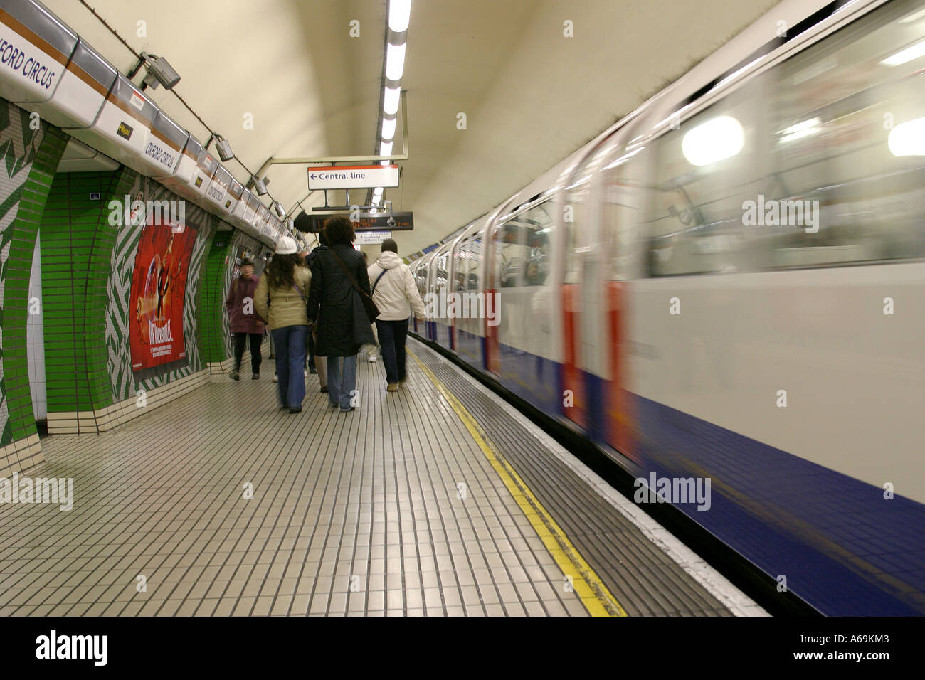 Train passing through station platform The Tube London UK Stock Photo
