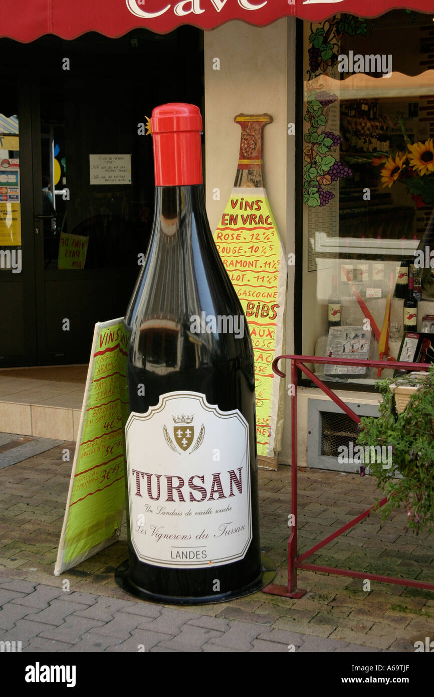 Giant bottle of red wine outside a wine shop Aire sur l'Adour France