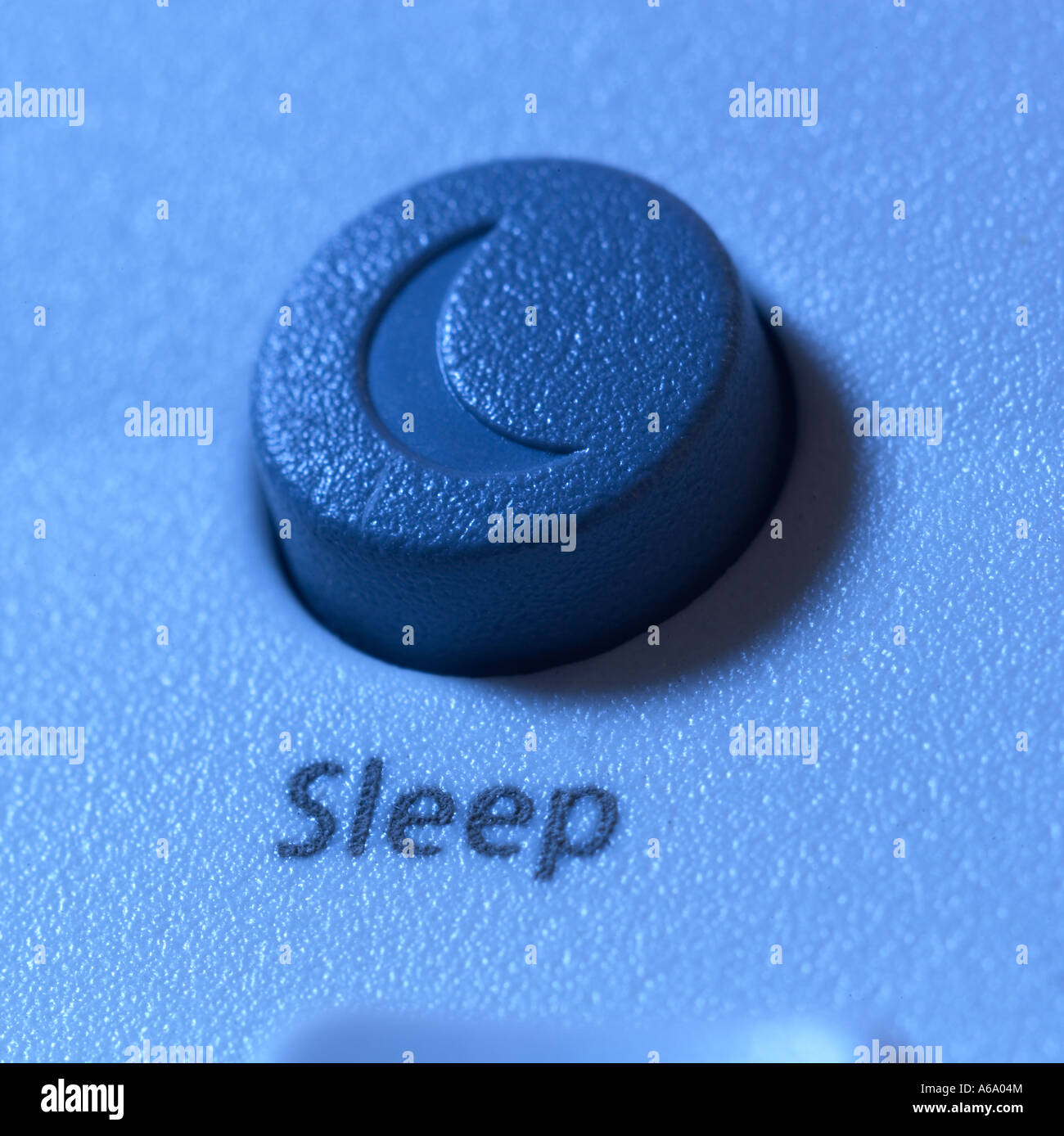 sleep icon from a computer keyboard with a cool blue glow Stock Photo