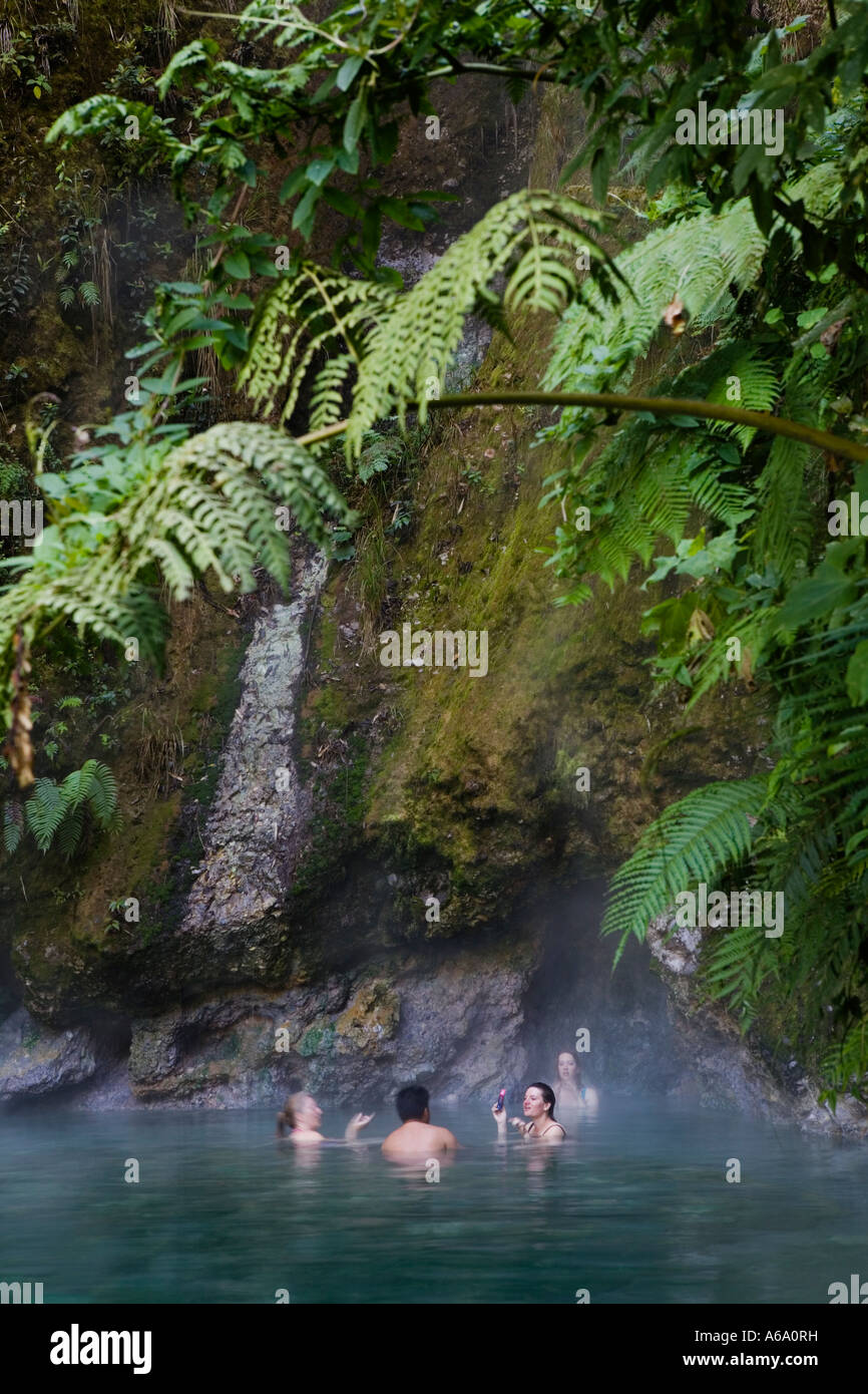 Tourists bathe in hot springs at Fuentes near Zunil, Guatemala, February 2007 Stock