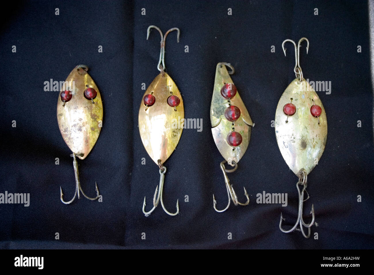 Antique gold spoon red jeweled eyed fishing lures. Clitherall