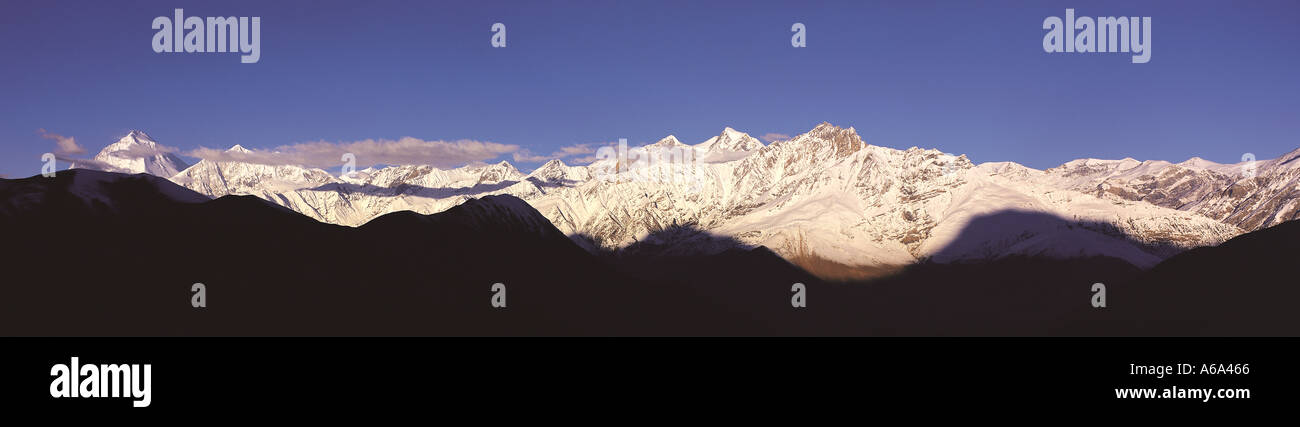 The Dhaulagiri range of peaks soon after sunrise west central Nepal Dhaulagiri I main peak over 8000m at extreme left Stock Photo