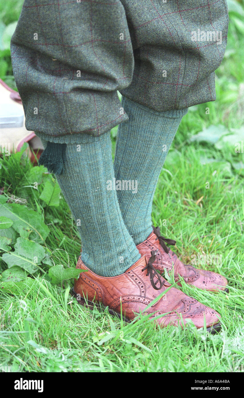 Salmon fishing on river Tweed Plus fours and brogues Stock Photo