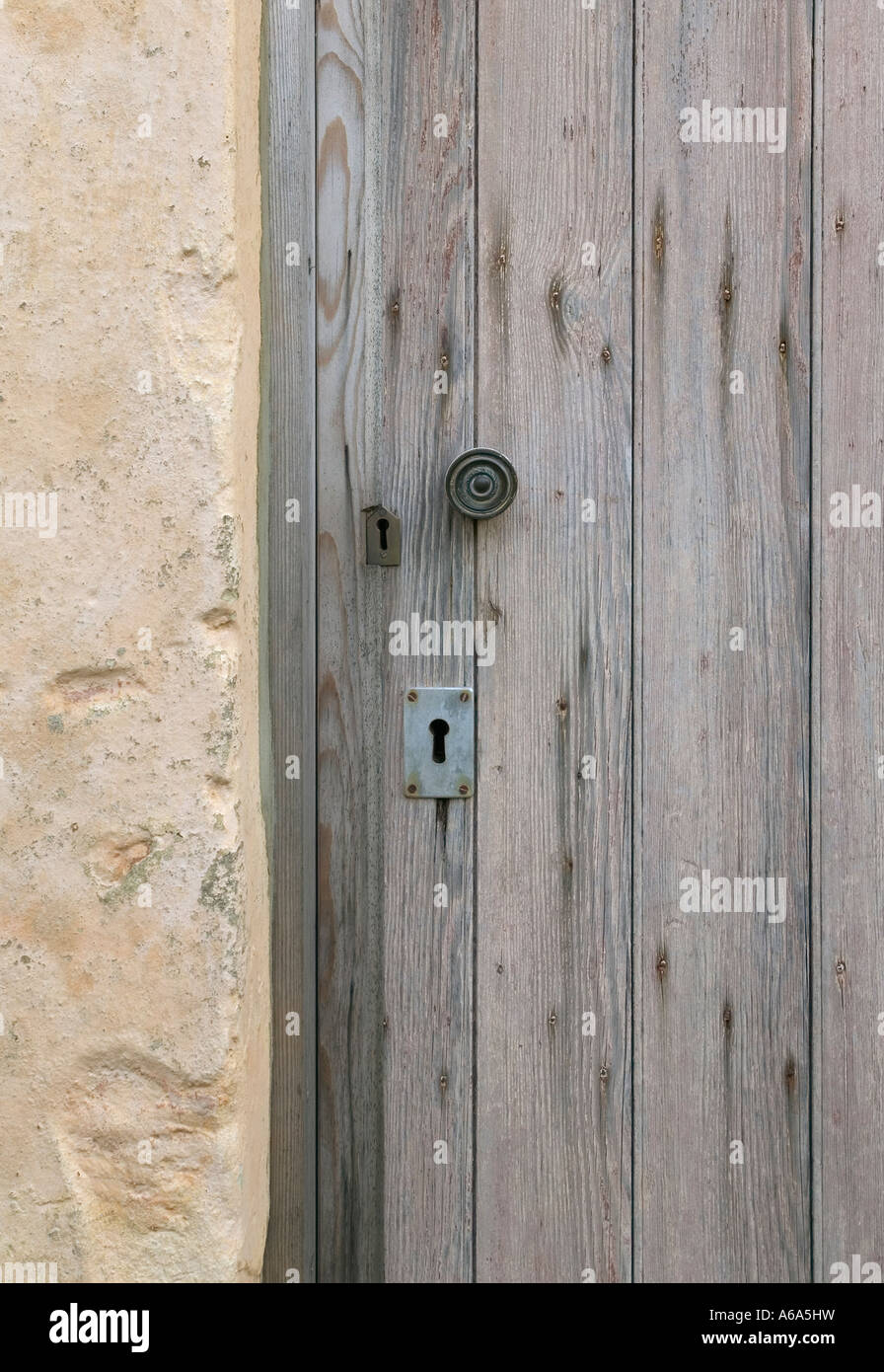 Section of an old weathered door in a 12th century derelict church Suitable for backgrounds Stock Photo