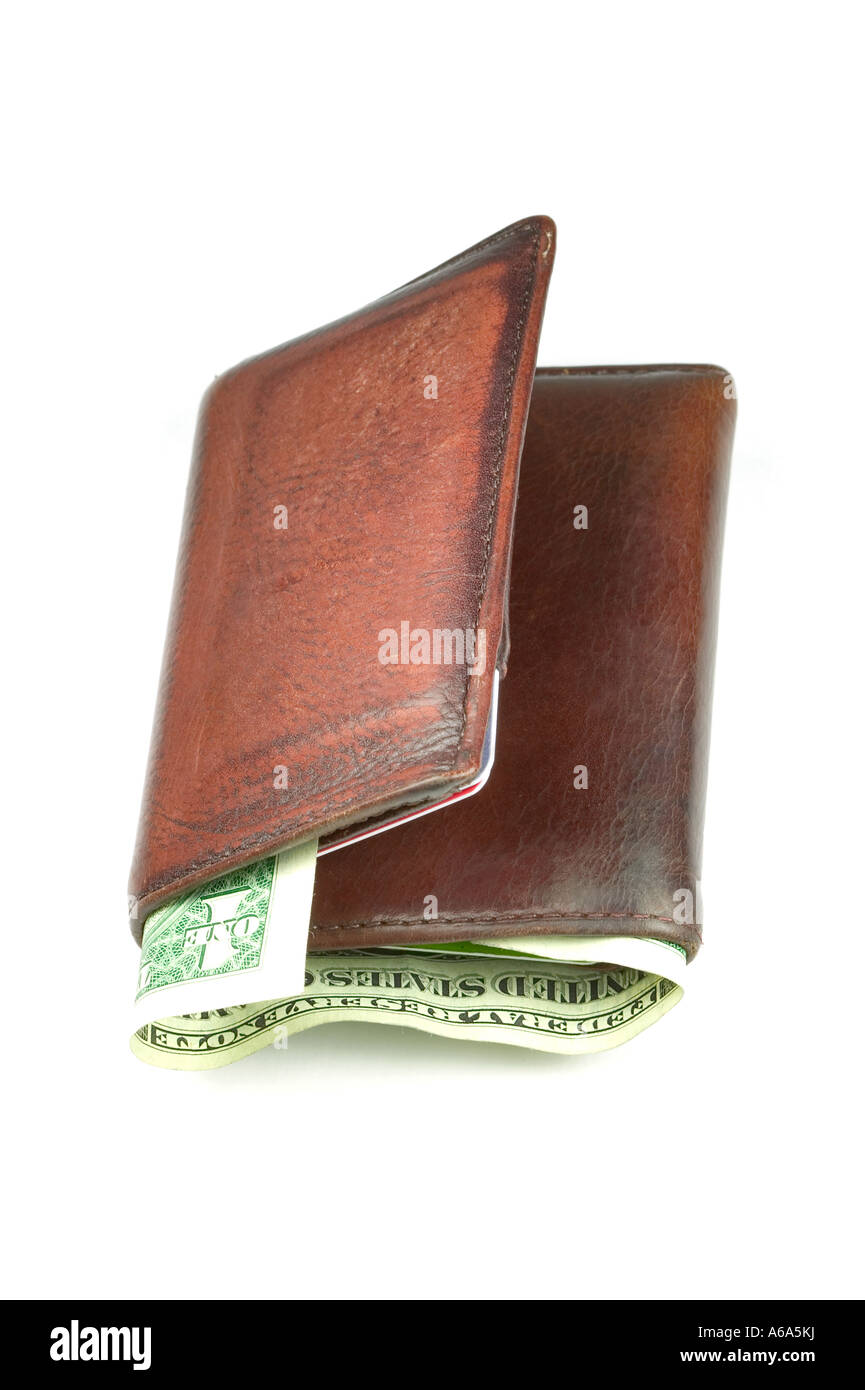 Old brown leather wallet with a dollar bill sticking out isolated on white Stock Photo