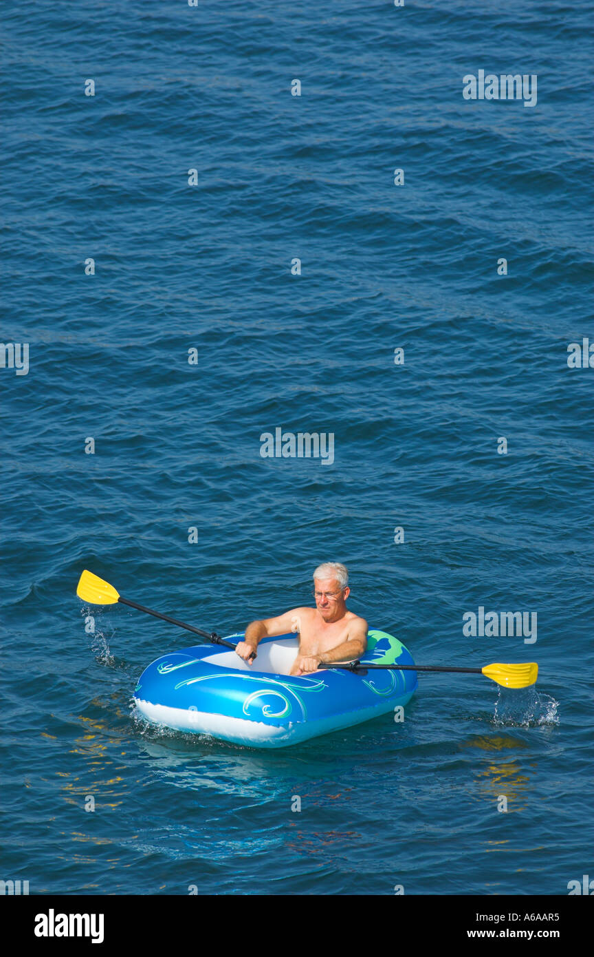 Rowing plastic boat Stock Photo - Alamy