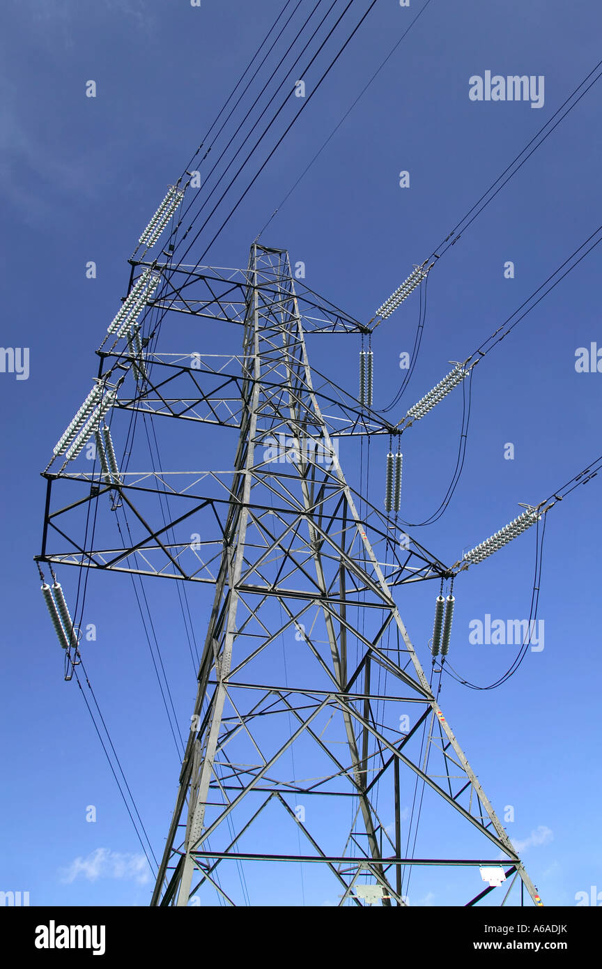 Electricity pylon against a blue sky Stock Photo - Alamy