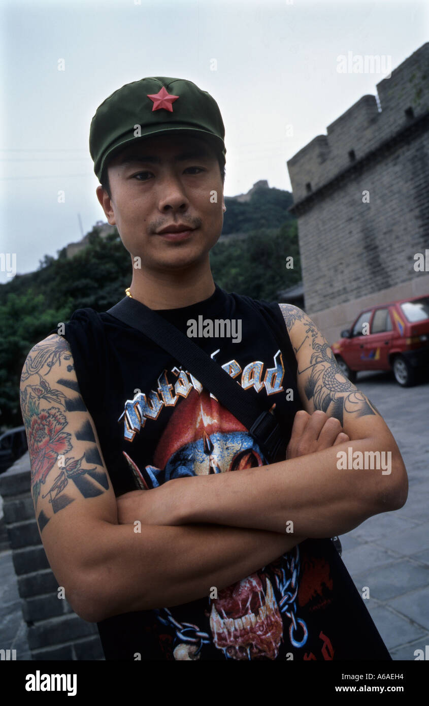 A Chinese young man with tattoo in the Badaling Great Wall in Beijing. 2005 Stock Photo