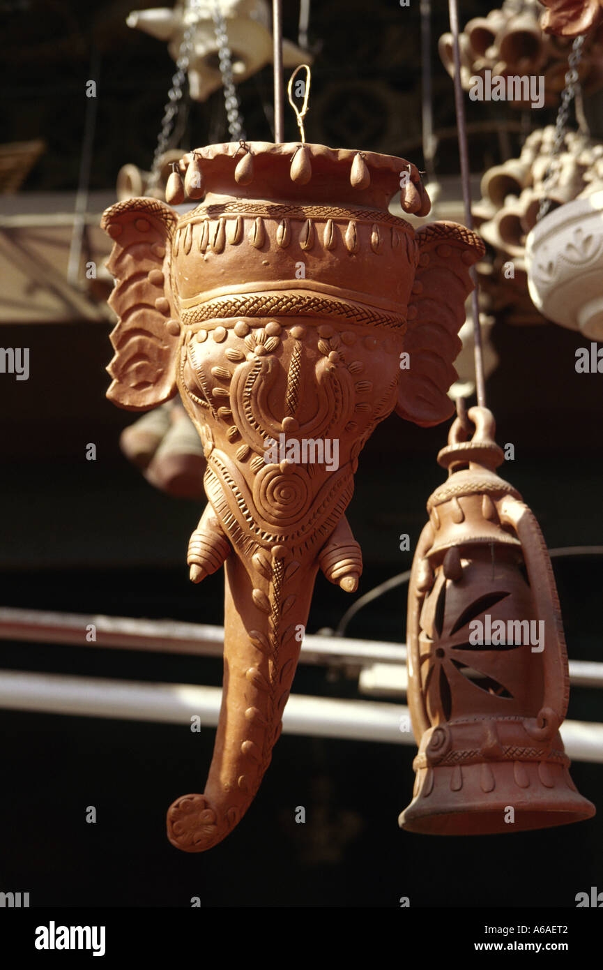 Terracotta lamps seen in market in Vadodara Gujarat India, one shaped as elephant head Stock Photo