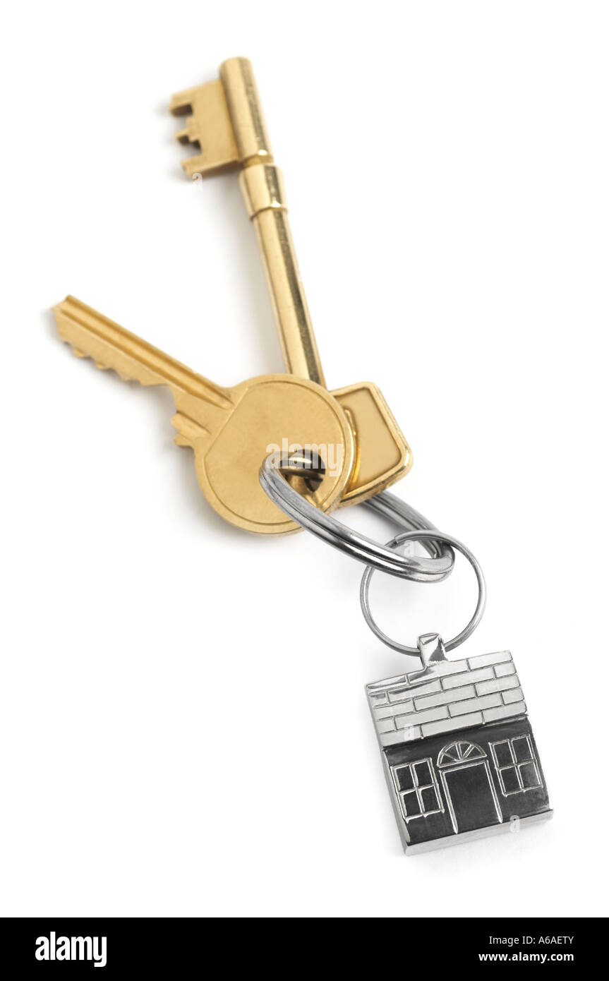 House shaped keyring with door keys Stock Photo - Alamy