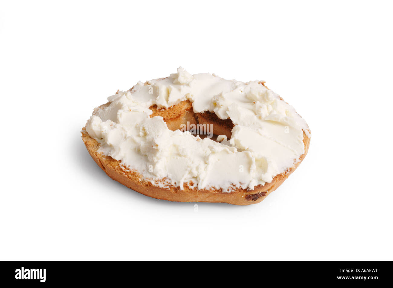 Cinnamon and raisin bagel with cream cheese on white background Stock Photo