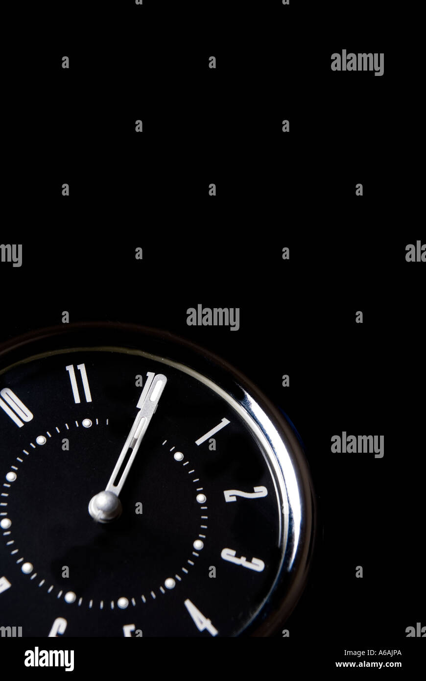 Alarm clock set at twelve o clock Stock Photo Alamy