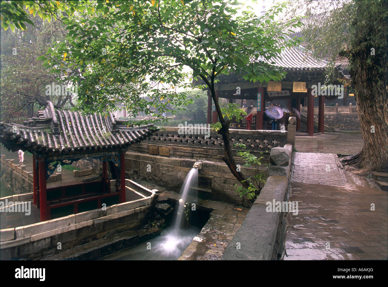 China, Shanxi, Taihuai, Wutai Shan, Jinci Si, terrace, and canal running through temple grounds Stock Photo