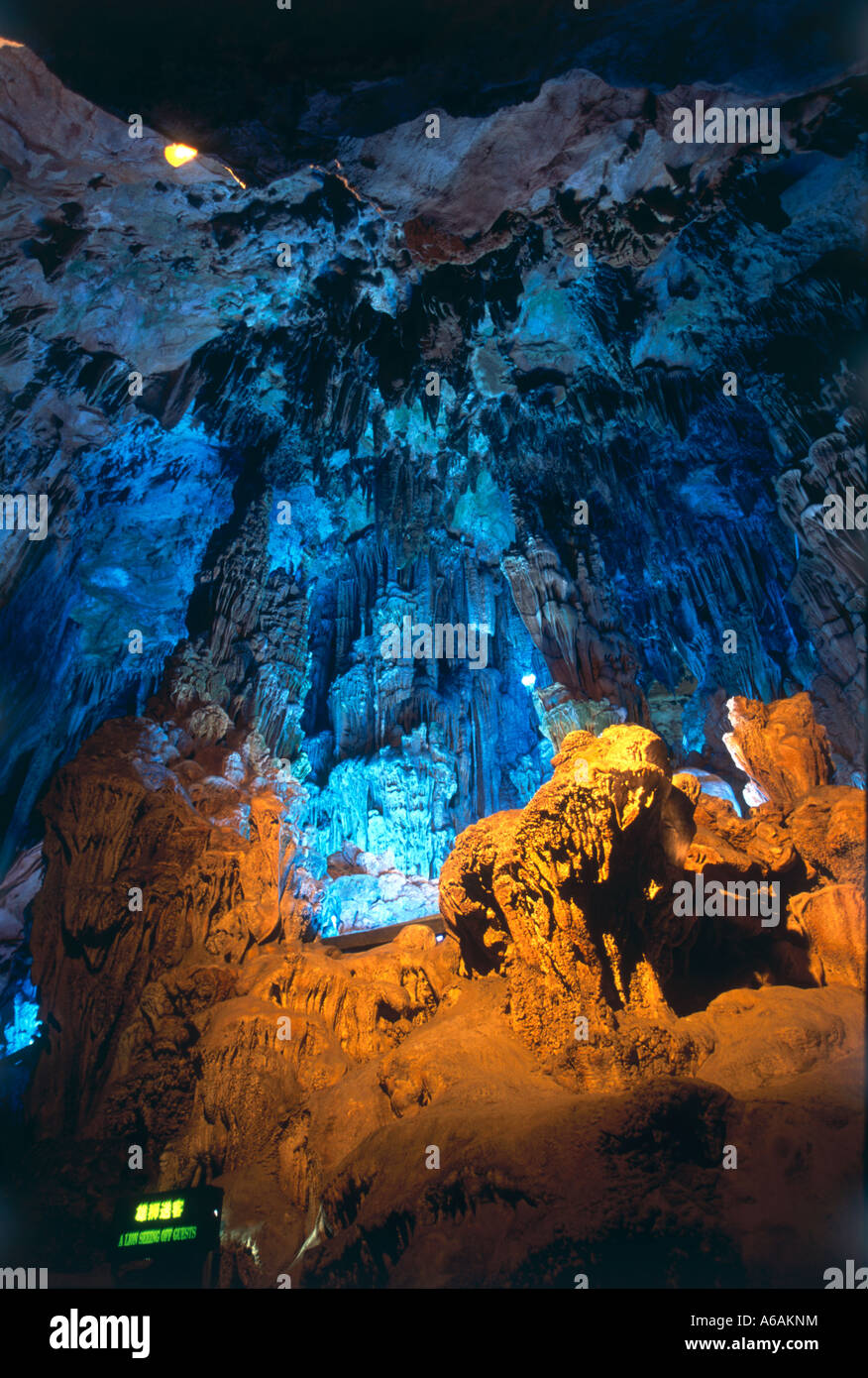 China, Guangxi, Guilin, Guangming Hill, Red Flute Cave,  illuminated hall in cave, stunning limestone formations in karst area Stock Photo