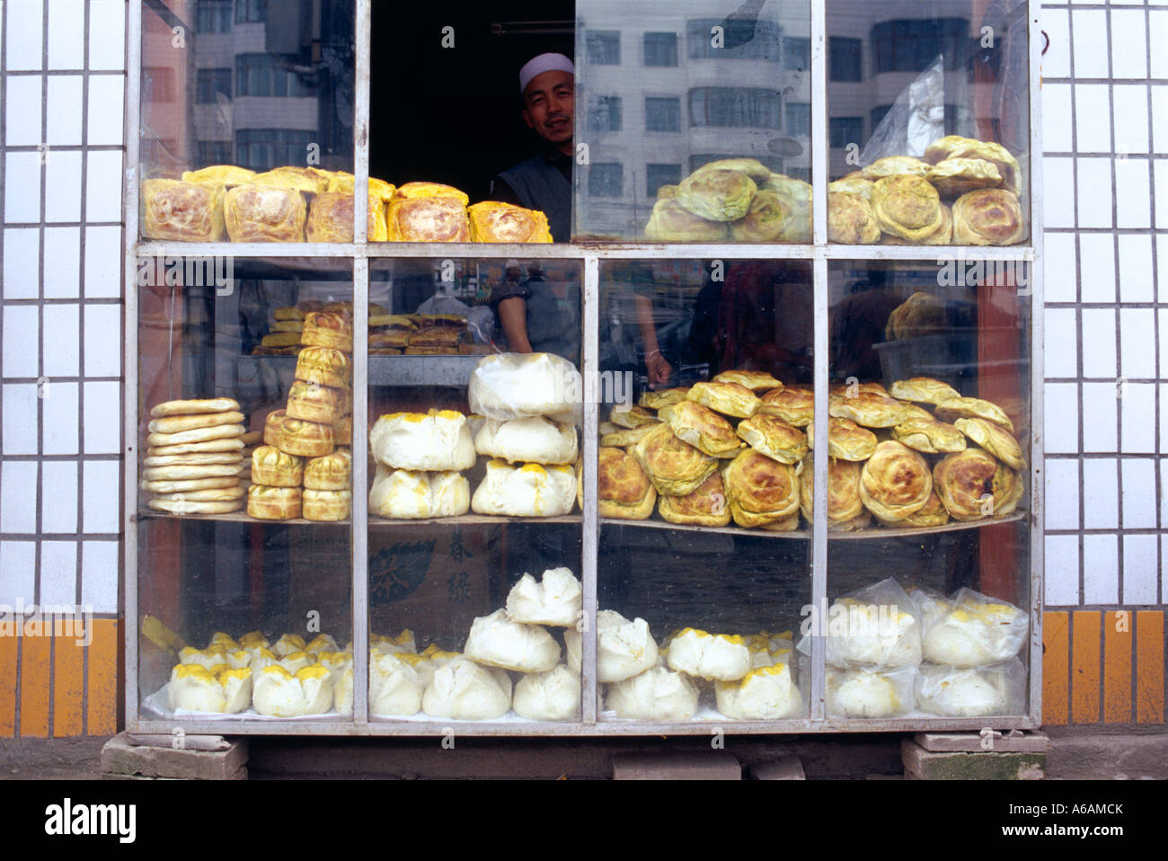 China, Gansu, Linxia, uighur bread stall in market Stock Photo