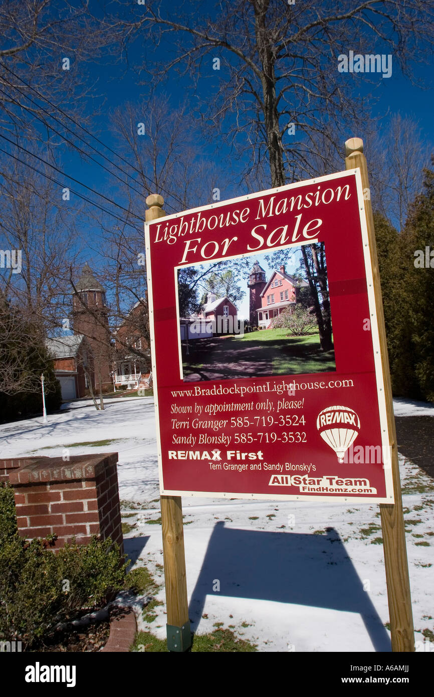 Lighthouse Mansion for sale sign, On lakeside of Lake Ontario near