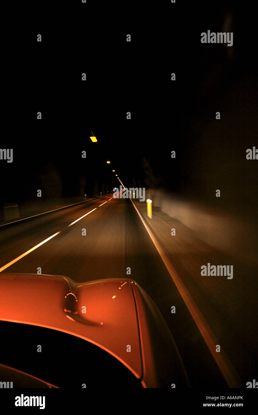 Car moving through Iceland's longest road tunnel Stock Photo Alamy