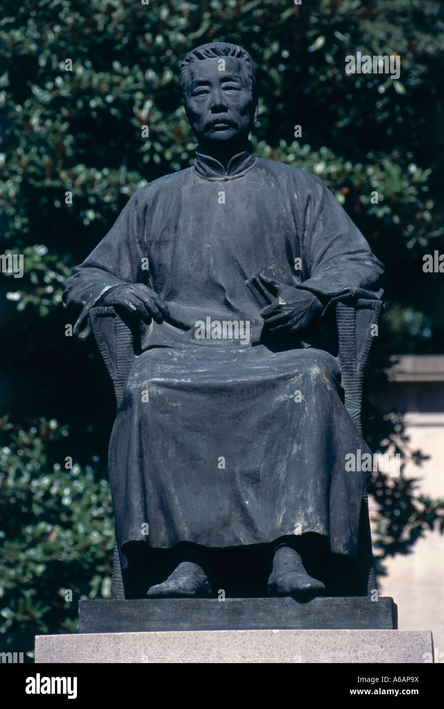 China, Shanghai, Hongkou Park, (Lu Xun Park), Lu Xun's Tomb, seated bronze statue of great Chinese novelist Stock Photo