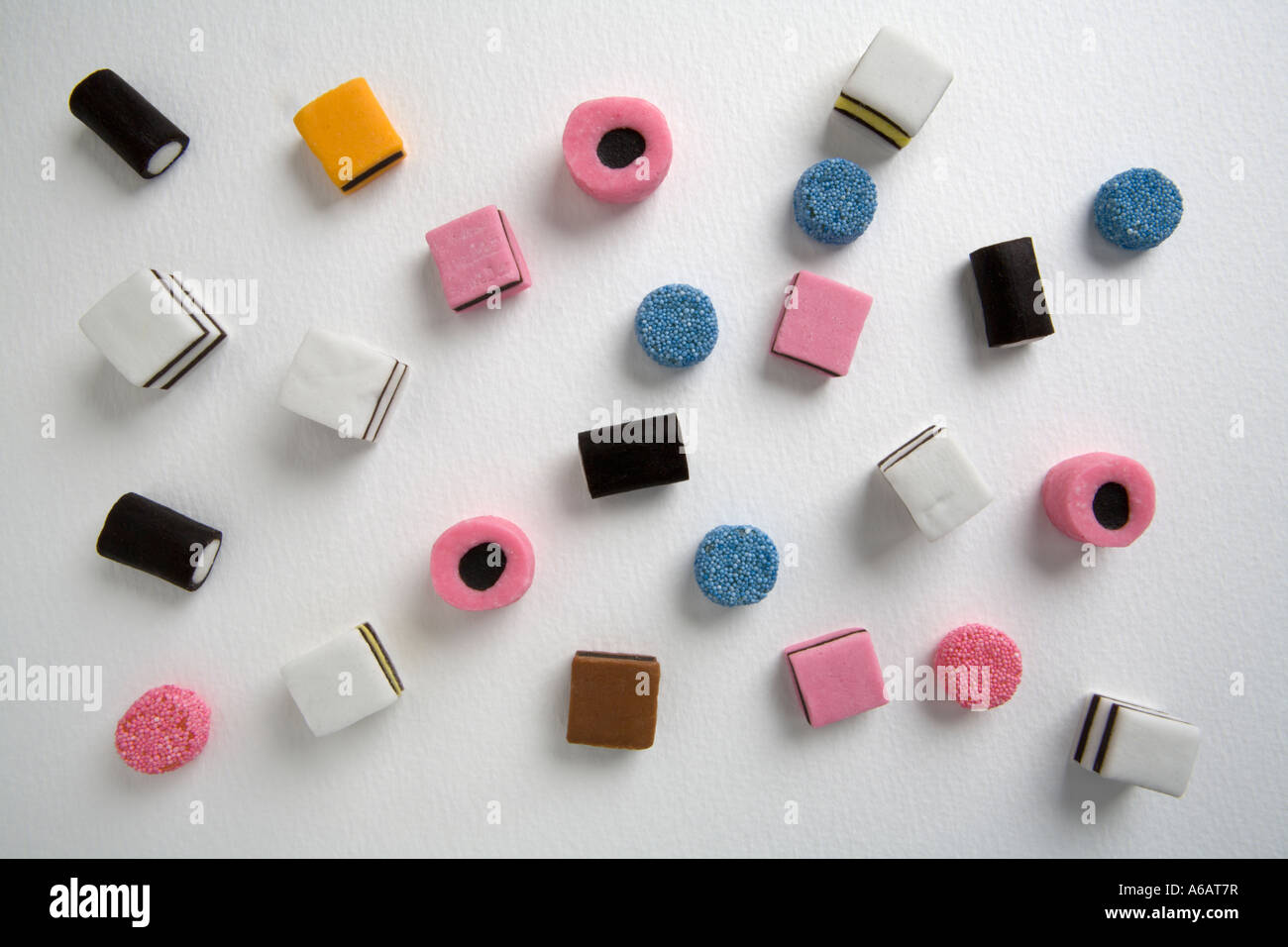 all different Liquorice Allsorts birds eye view on a white back ground ...