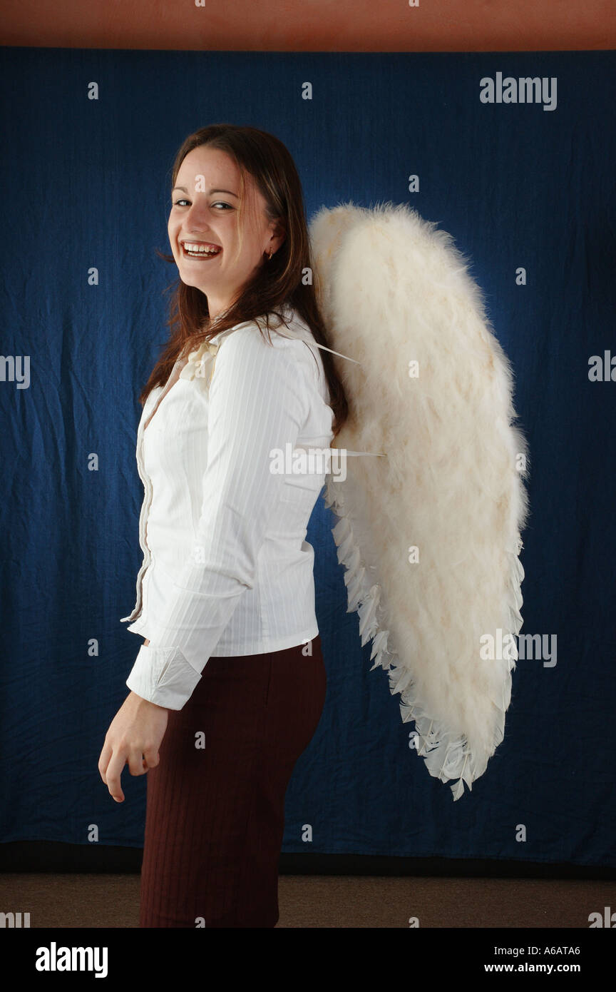 young woman poses as an angel in studio dsca 2112 Stock Photo