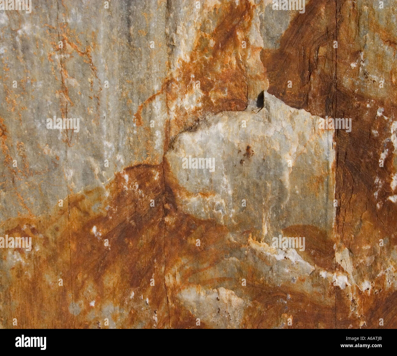 rust stained rock Stock Photo Alamy