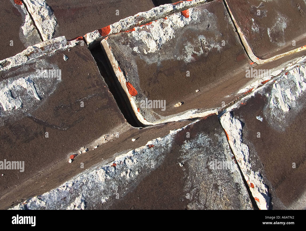upside down ridge tiles in reclamation yard Stock Photo - Alamy