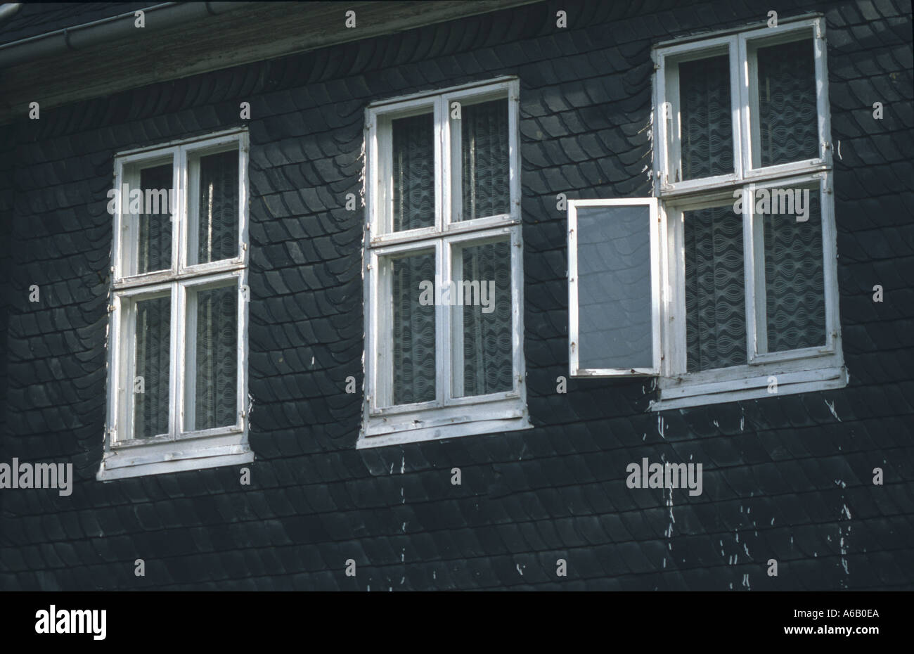 3 three windows in a house with slate Germany Bavaria Frankenwald Stock Photo
