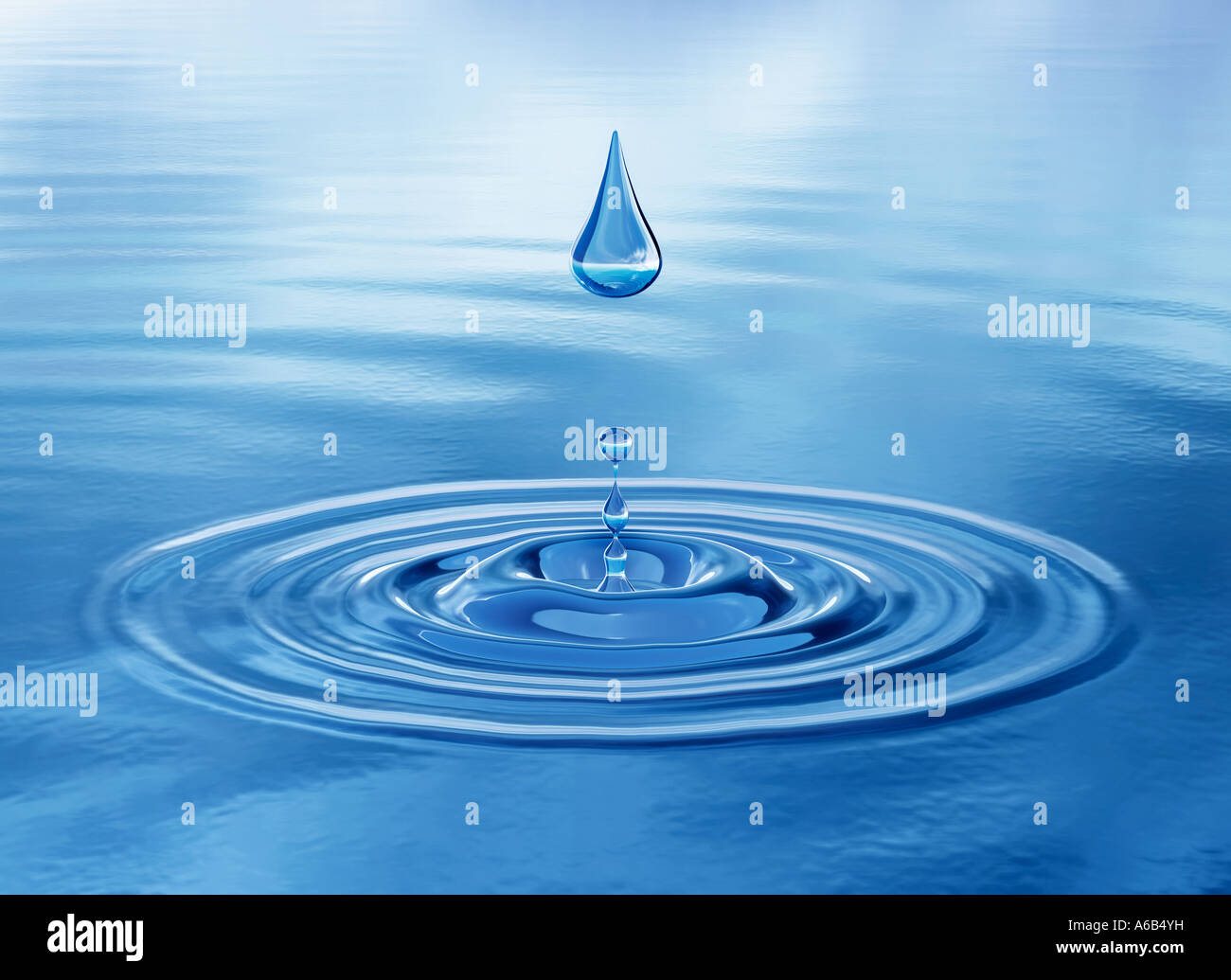 raindrop waterdrop on surface of water drop of water symbol of weather resource nature ecology Stock Photo