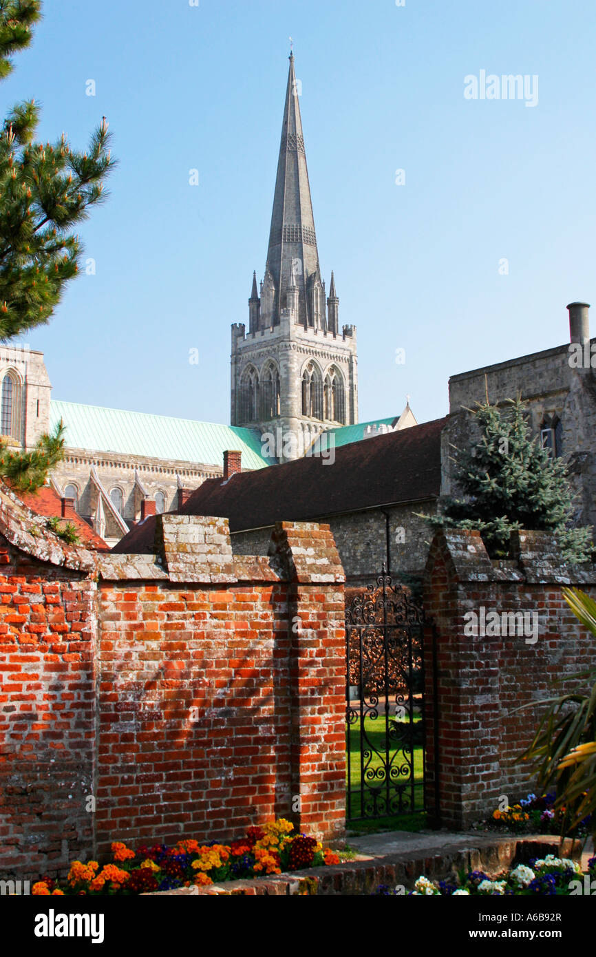Spire of Chichester Cathedral viewed from the walled Bishops Palace Gardens. West Sussex, UK Stock Photo
