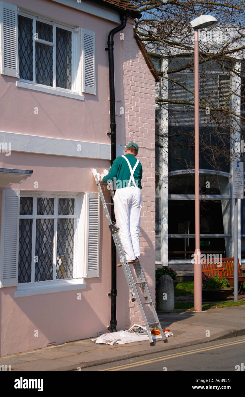 Man ladder house exterior hi-res stock photography and images - Alamy