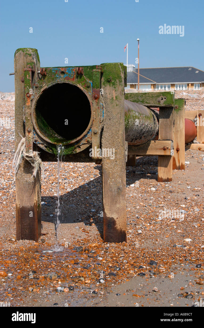 Sewage outlet pipe on beach at low tide in Worthing Sussex Stock Photo Alamy
