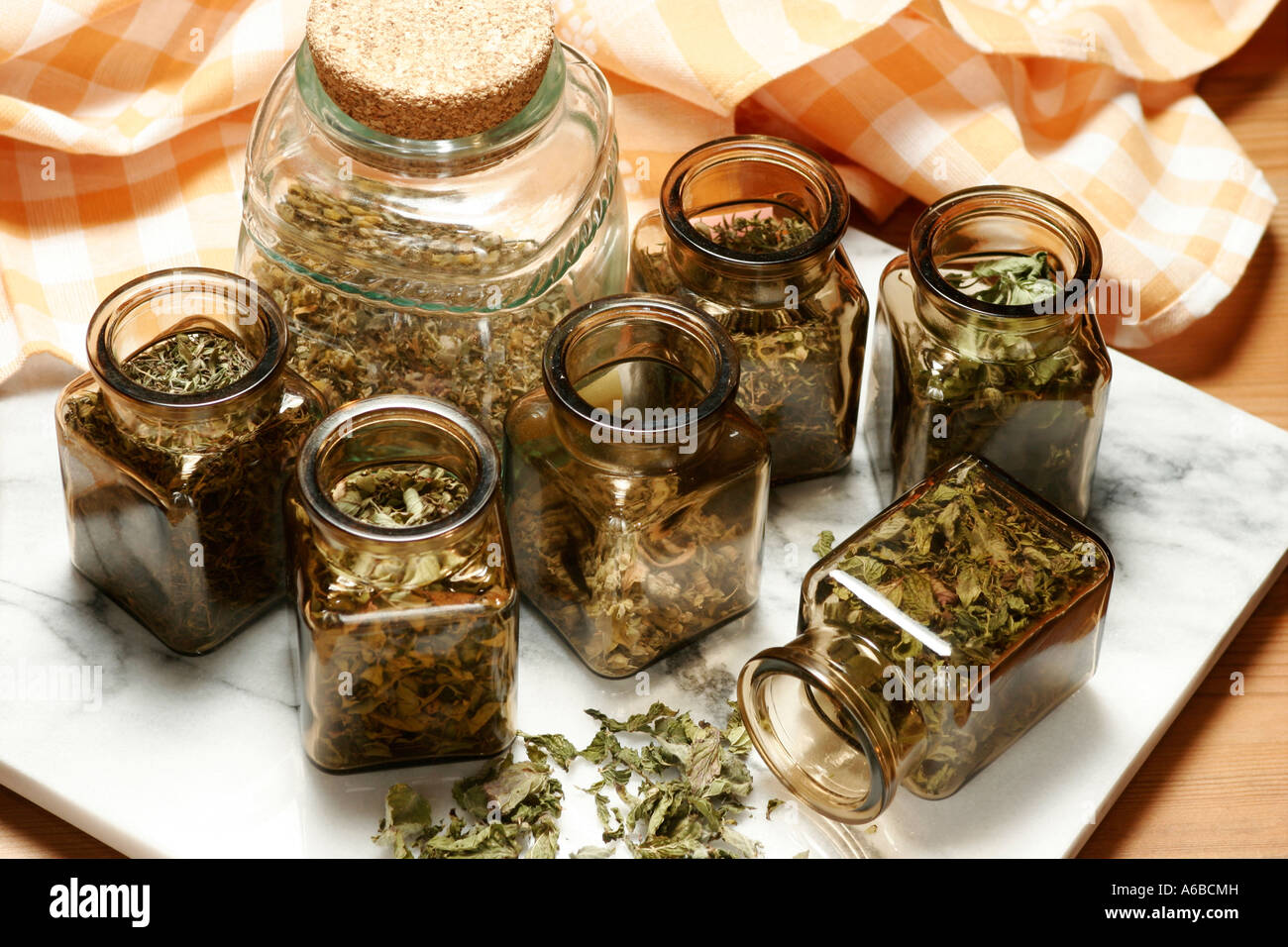 Kuechenkraeuter in Glaesern, Dried Mixed Herbs Stock Photo