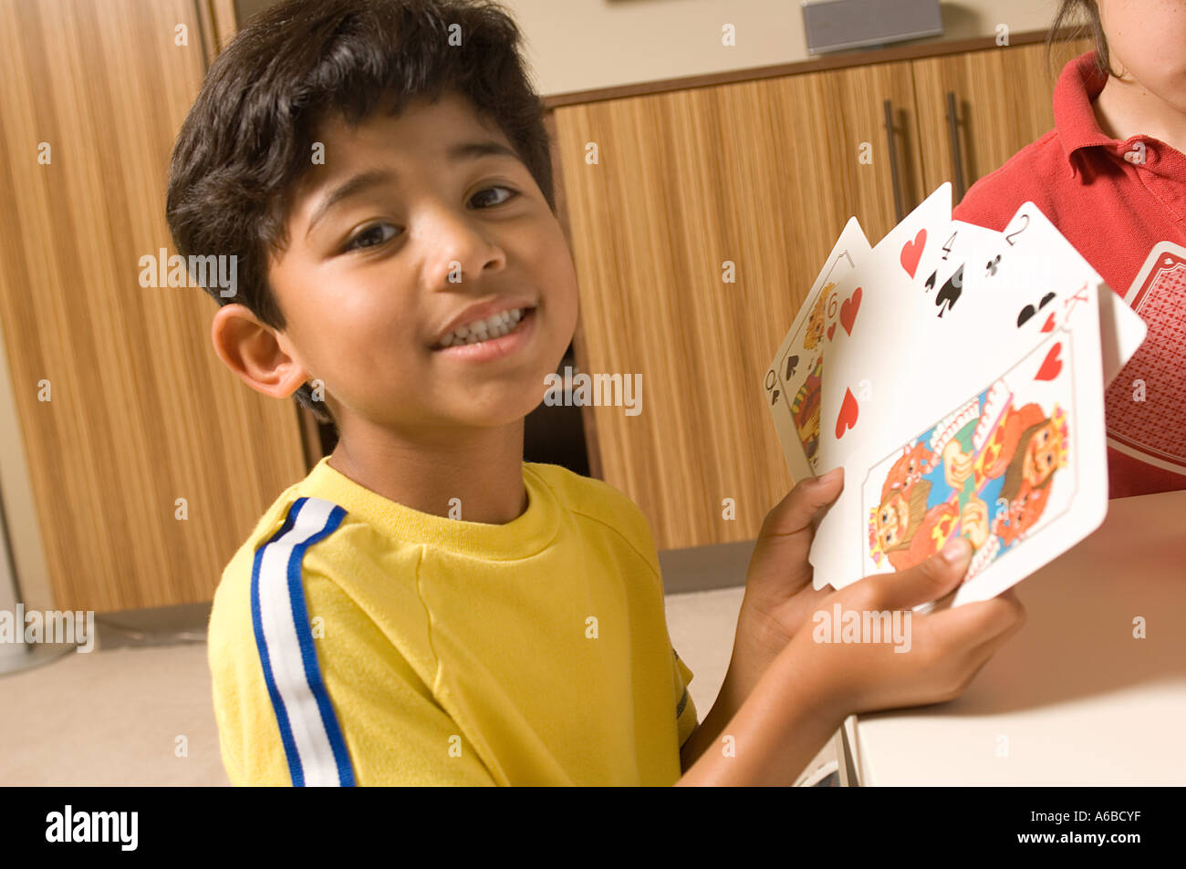 Portrait of boys playing cards Stock Photo Alamy