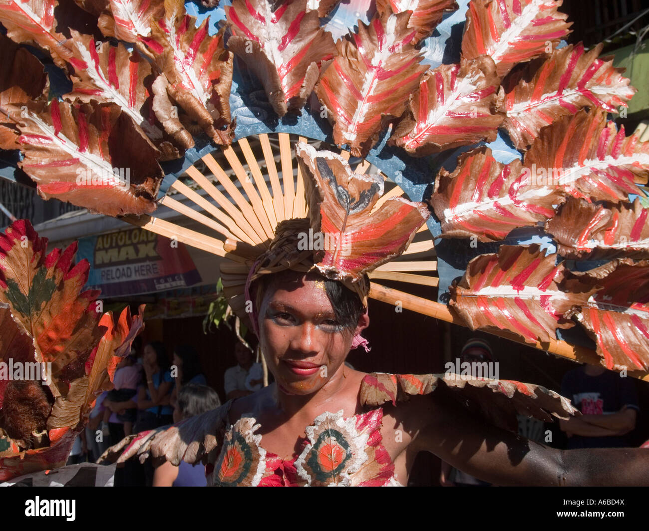 A riot of colors adorns a ladyboy Ati Atihan Festival Philippines Stock Photo