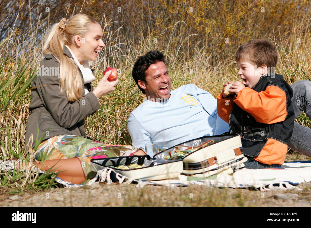 Young family doing picnic Stock Photo