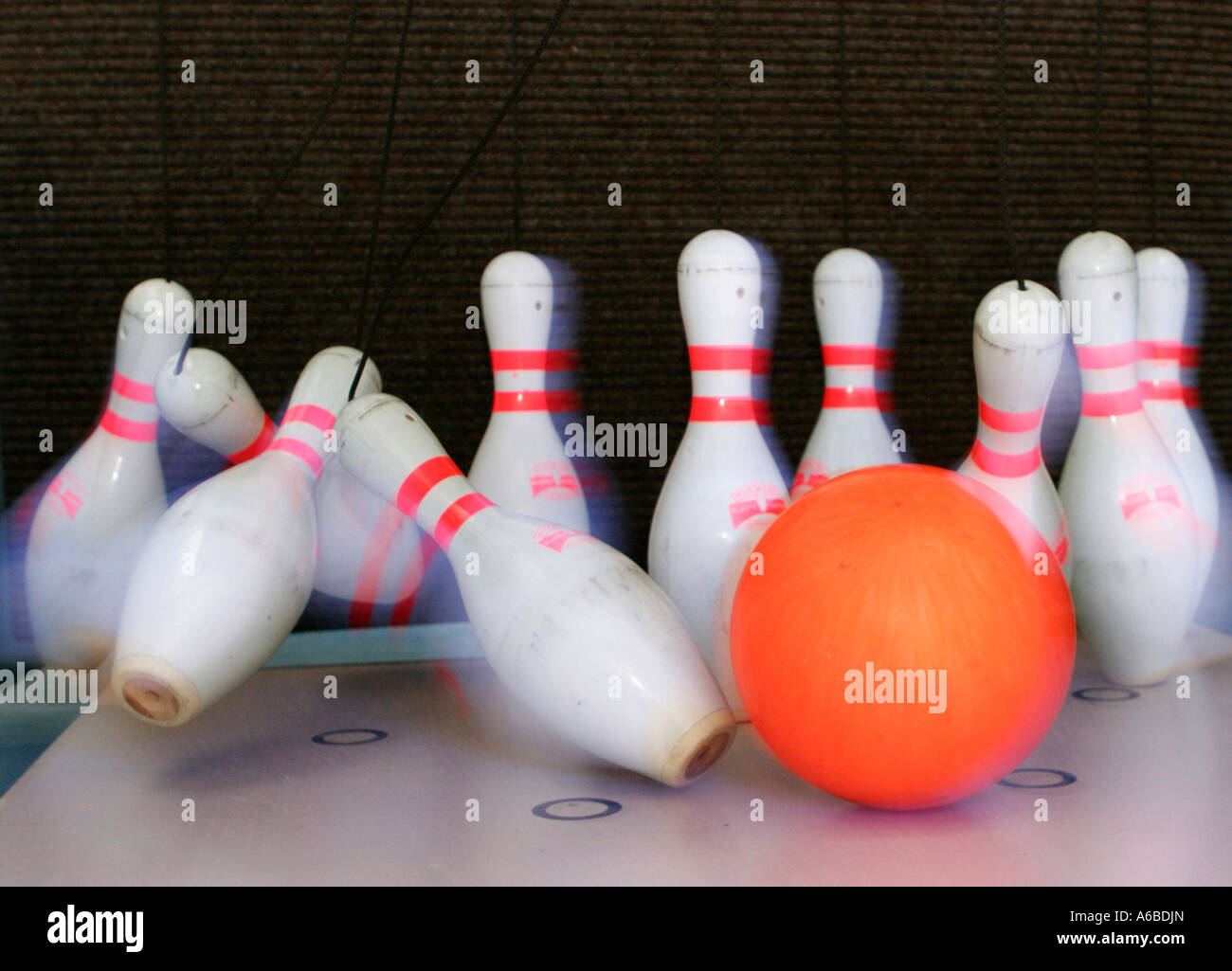 Falling Skittles in the Bowling Tunnel Stock Photo