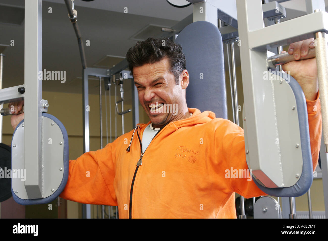 Man Exercise in Fitness Studio Stock Photo