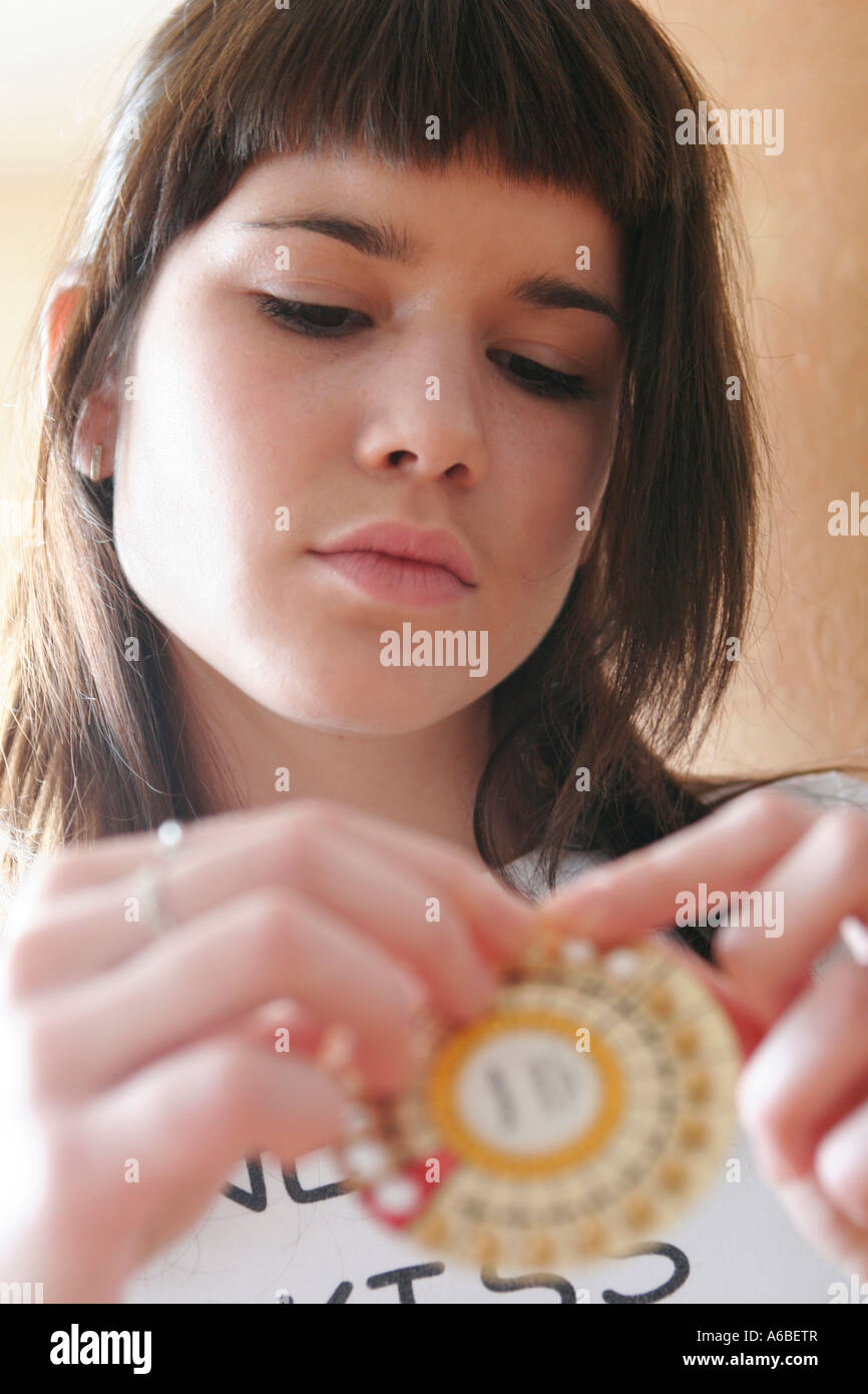 teenage girl with contraceptive pills Stock Photo
