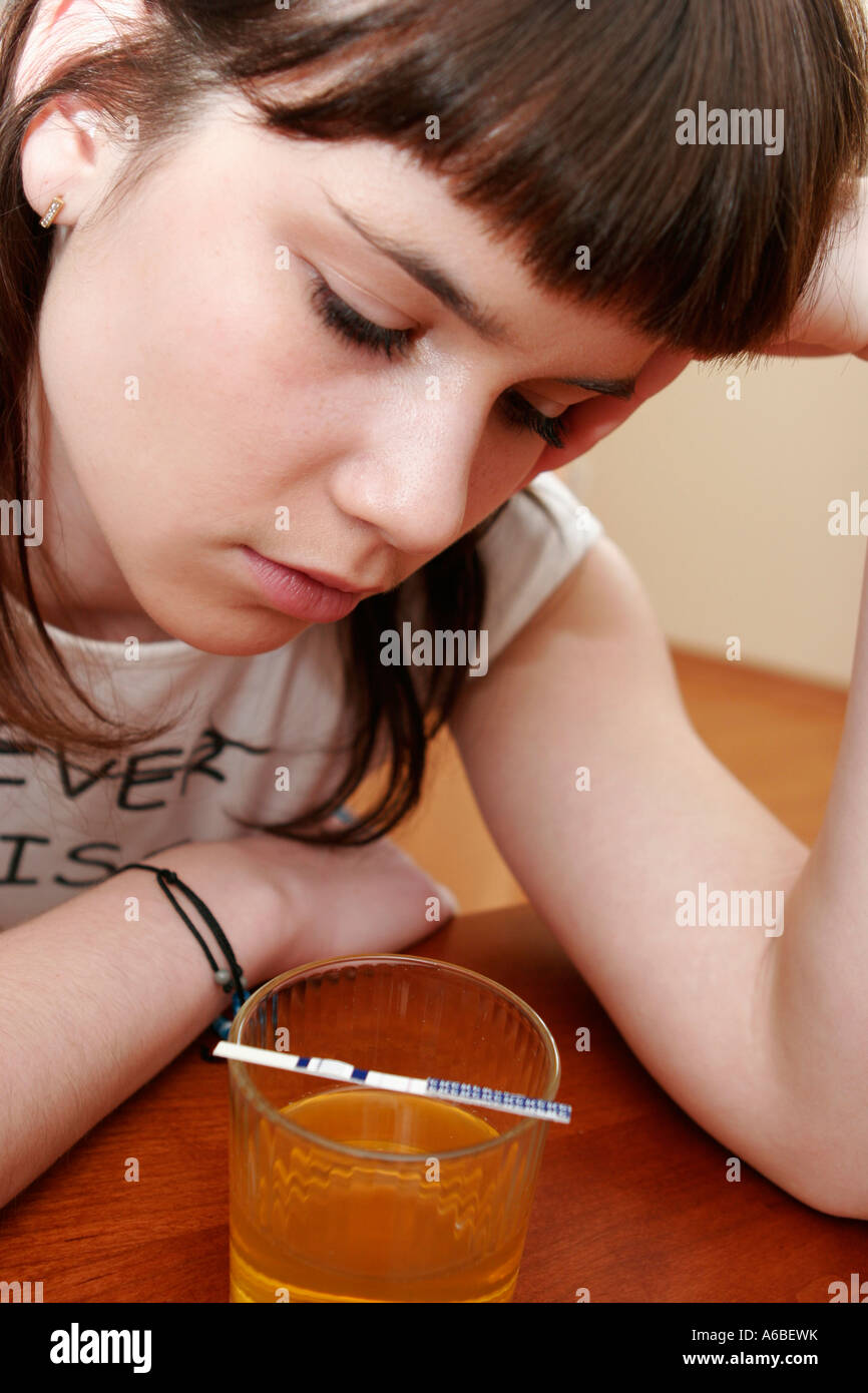 teenage girl, woman with results of pregnancy test Stock Photo