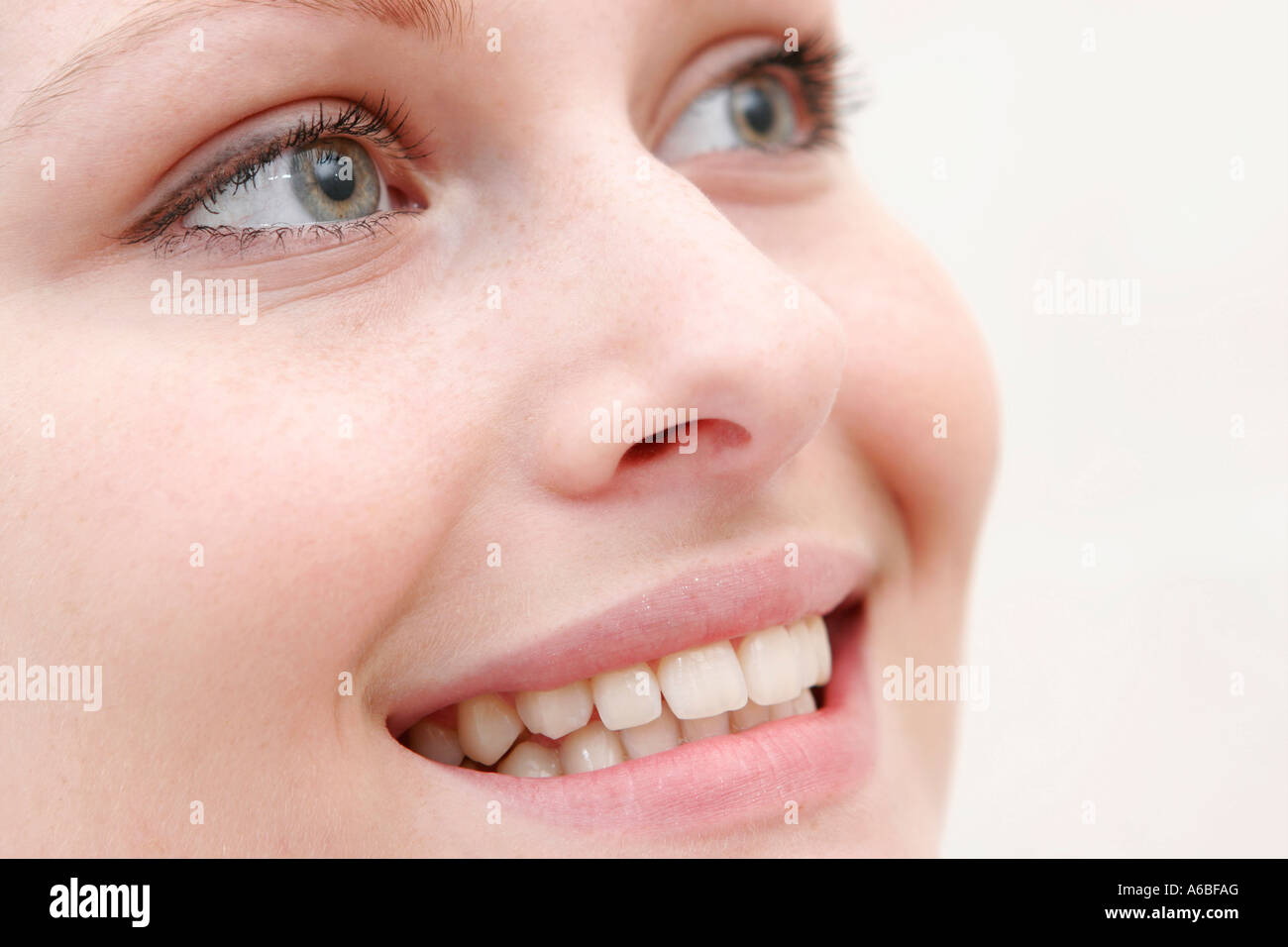 woman smiling in close up, teeth showing Stock Photo