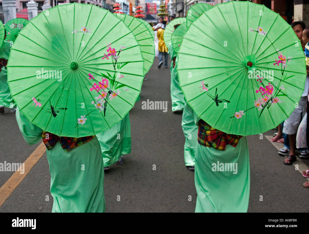 a pair of parasols walking through the Sinulog Festival Cebu Philippines  Stock Photo - Alamy