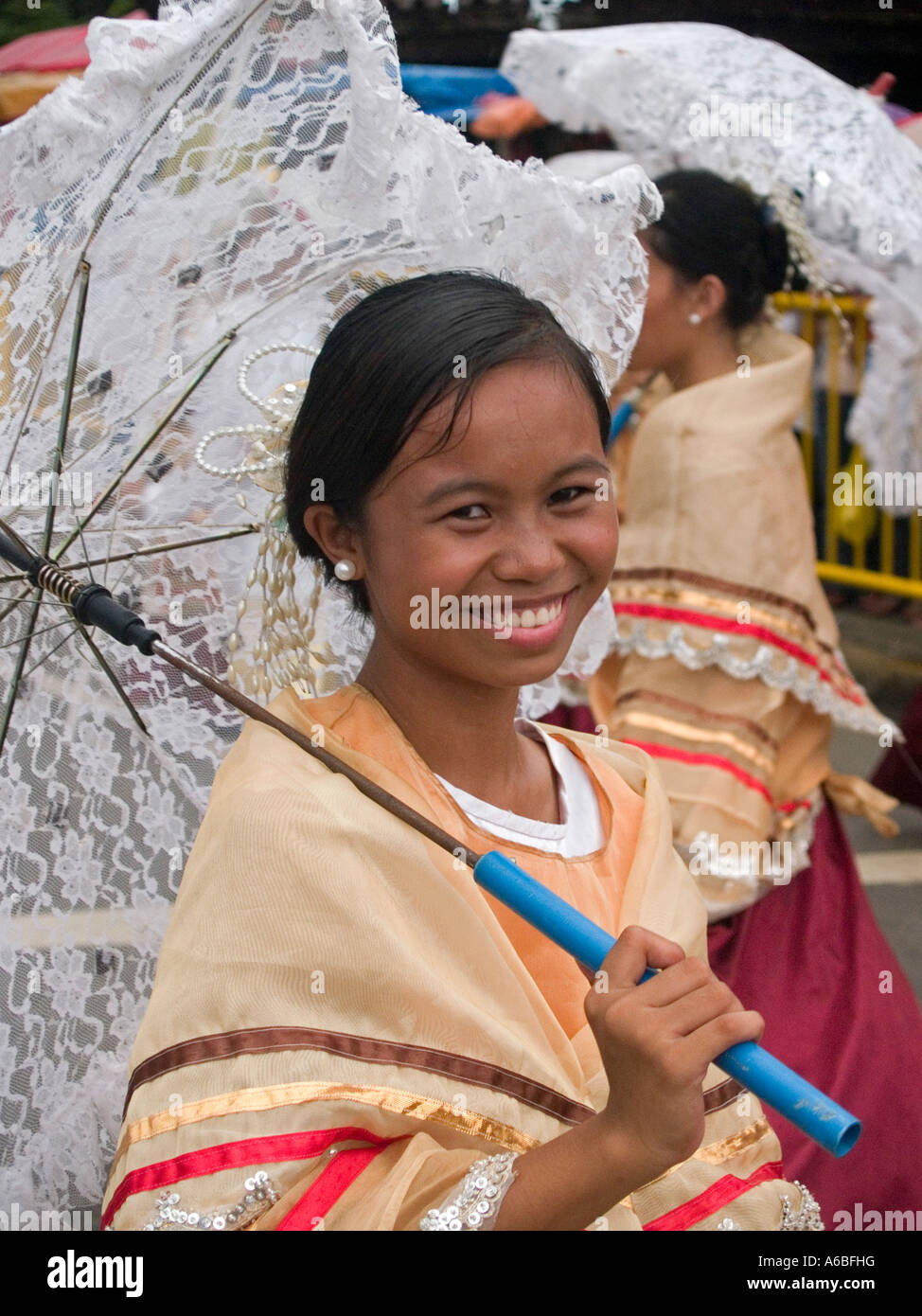 girl with the white parasol Sinulog Festival Cebu Philippines Stock Photo -  Alamy