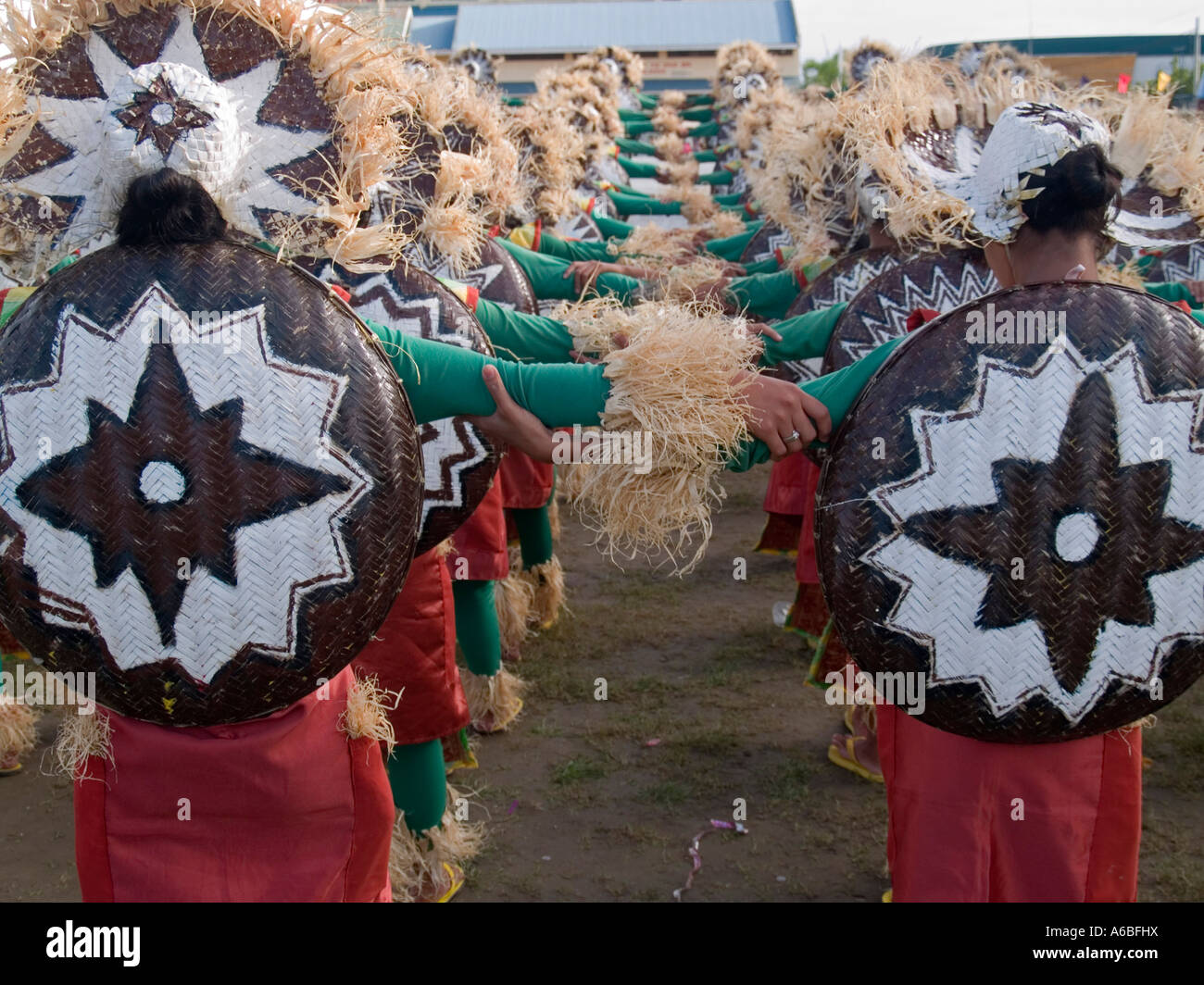 arm in arm dancers at the colorful Sinulog Festival Cebu Philippines
