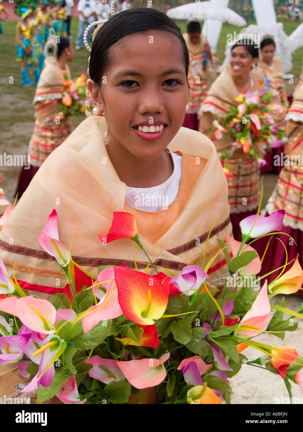 with a bouquet of flowers performer at Sinulog Festival Cebu Philippines Stock Photo Alamy
