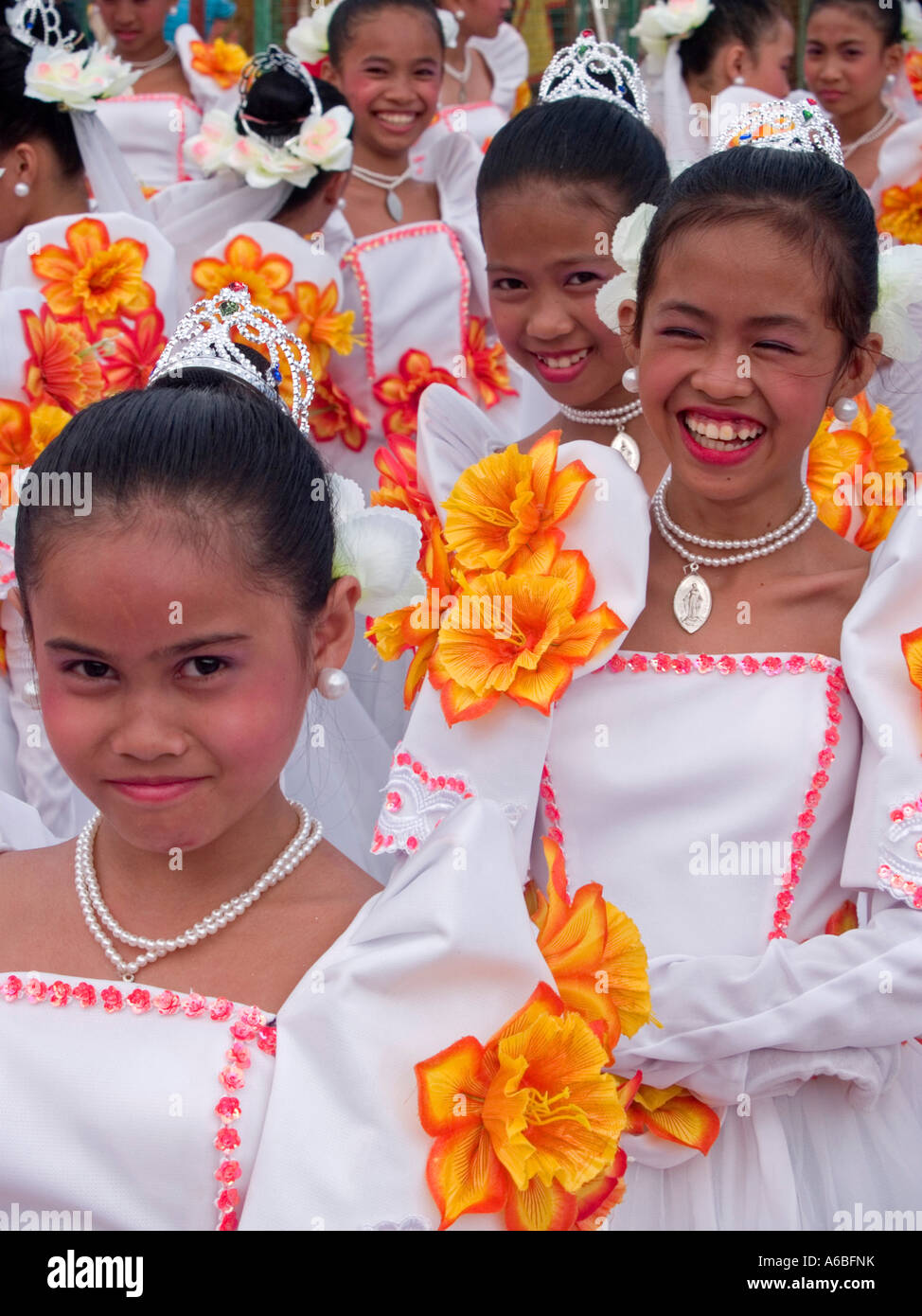 flowers and smiles girls at the annual Sinulog Festival Cebu ...