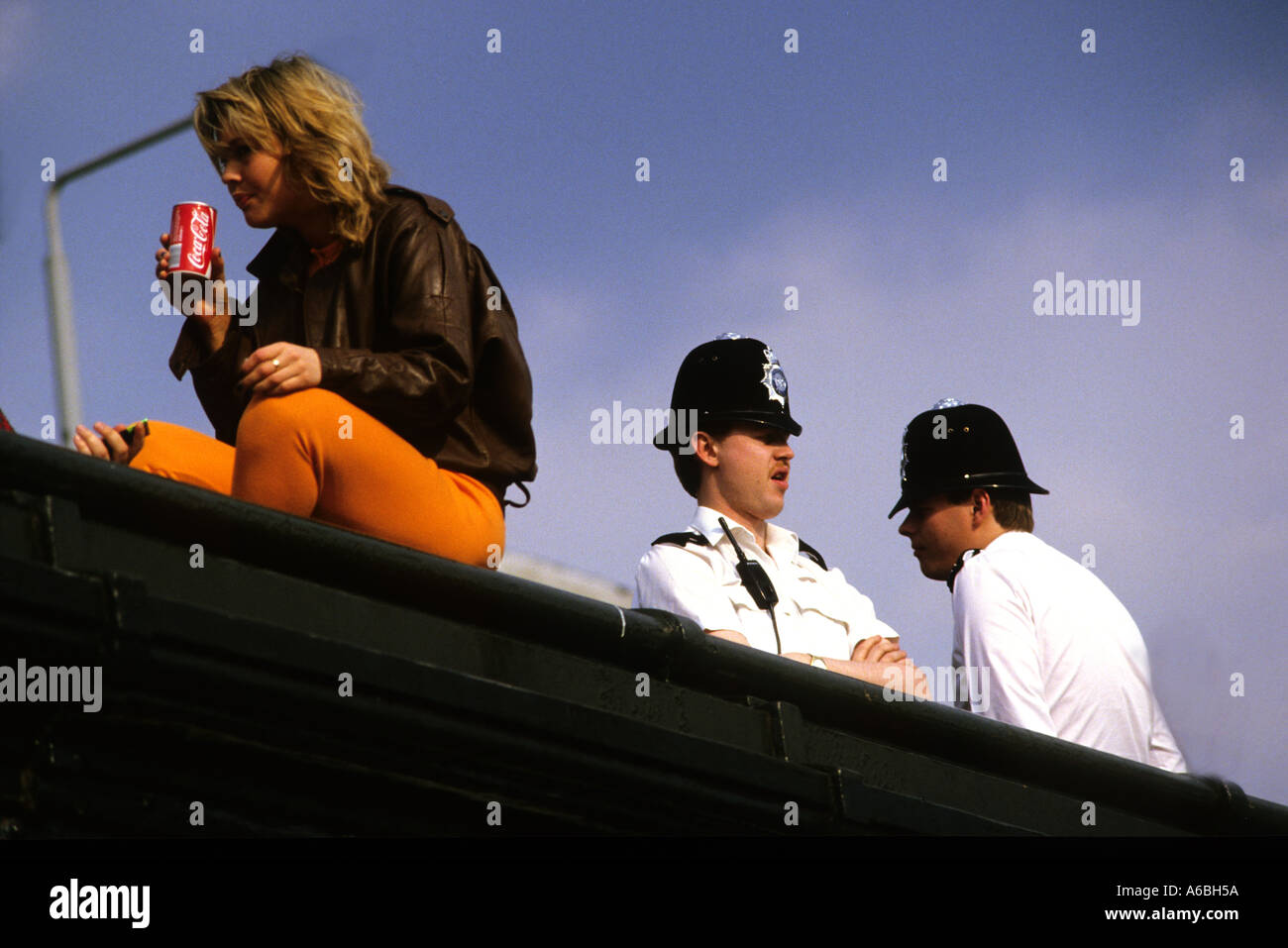 TWO POLICE MEN  AND A GIRL AT CAMDEN LOCK MARKET LONDON UK Stock Photo