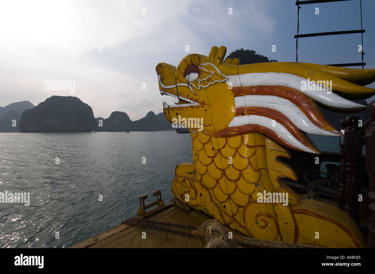 A dragon s head adorns the front of a tourist live aboard boat in Vietnam the Vietnamese belive this brings luck to the boat Stock Photo